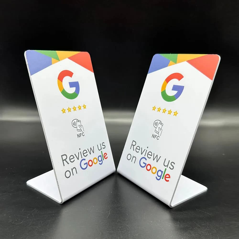 Two NFC stands reading "Review us on Google", the product you set up and sell to local shops